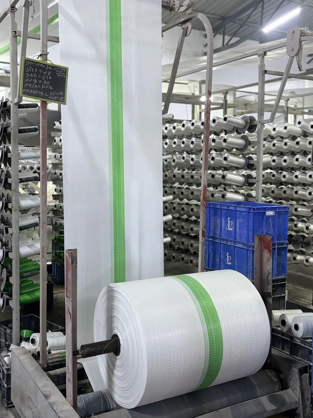 Winding — Marker-stripe fabric coming off the winder