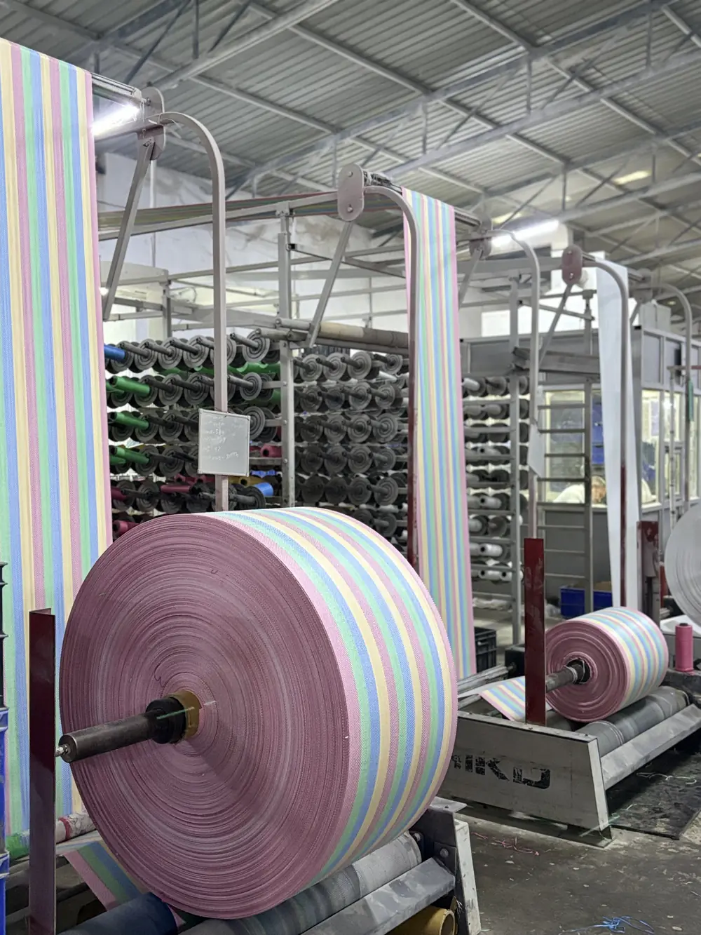 Production — A pastel-stripe order mid-run