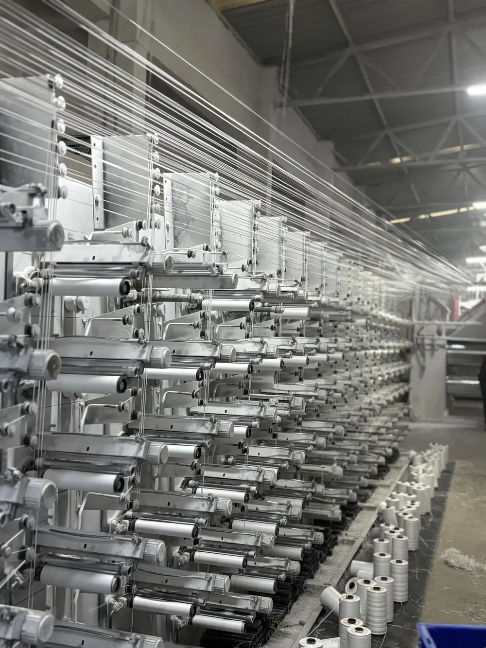 Extrusion — Flat-tape winding line drawing PP tape onto bobbins