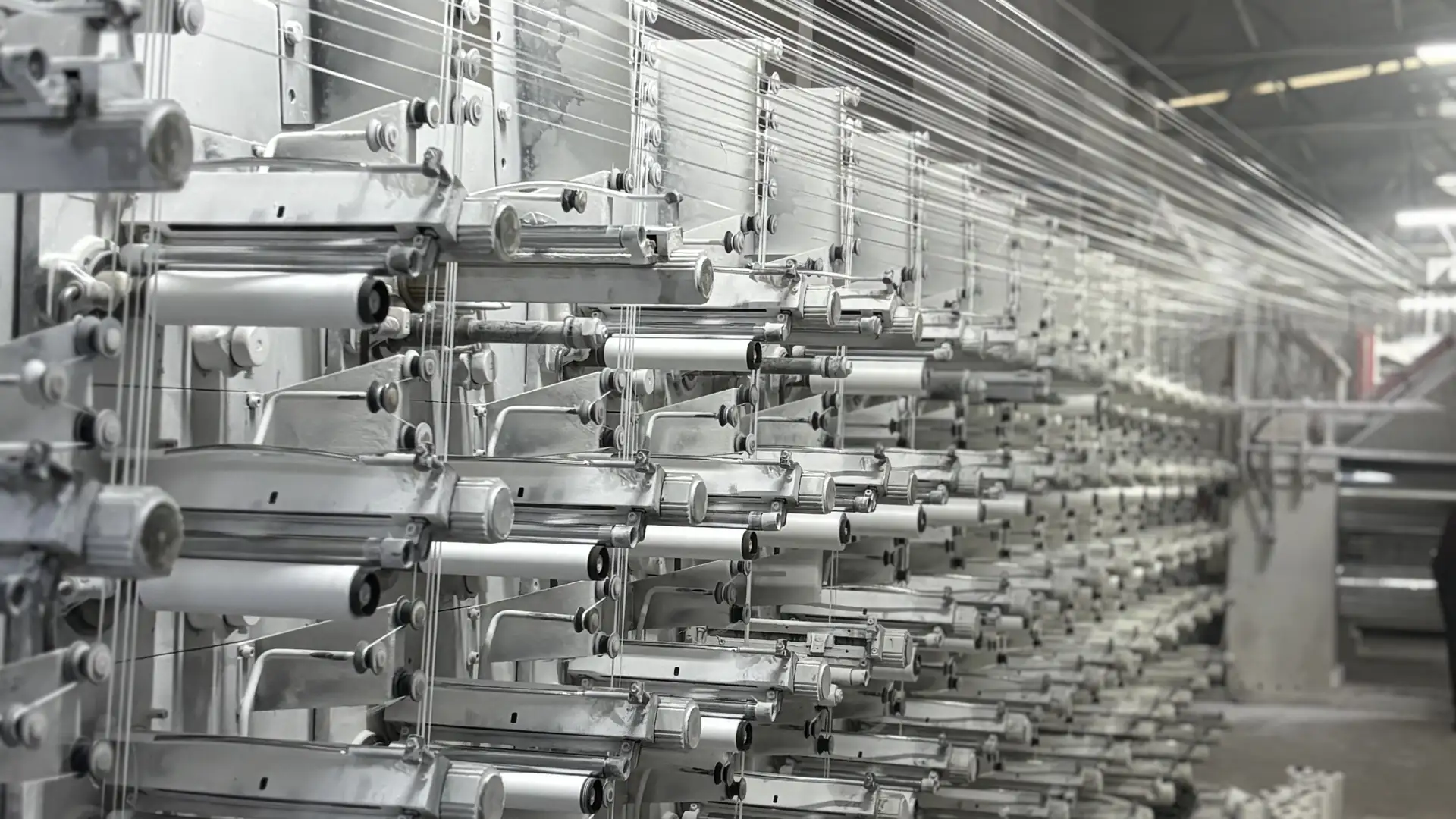 Extrusion — Flat-tape winding line drawing PP tape onto bobbins
